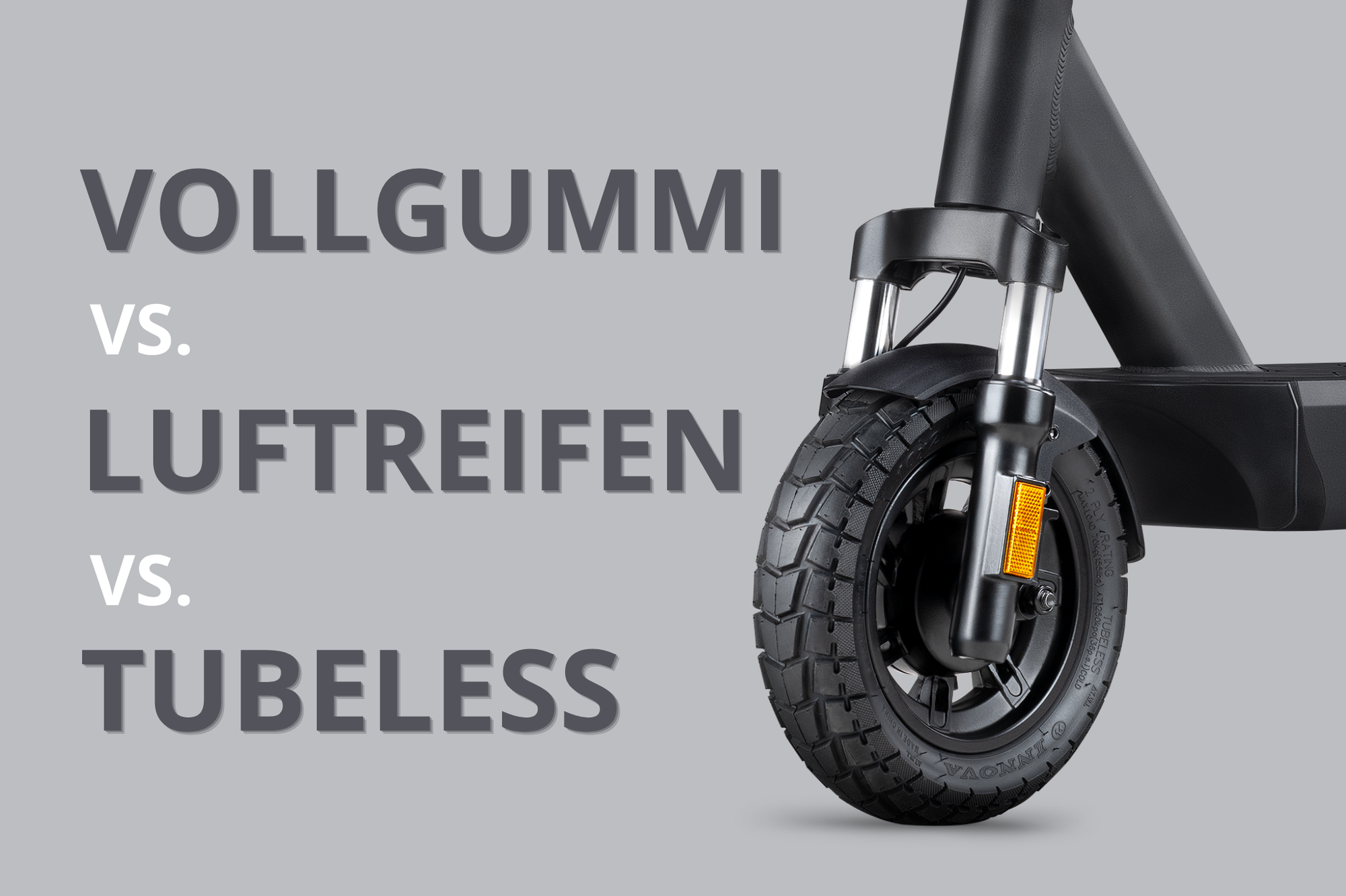 Nahaufnahme eines VMAX E-Scooter-Vorderrads mit Beschriftung: Vollgummi vs. Luftreifen vs. Tubeless – Vergleich verschiedener Reifenarten bei E-Scootern.